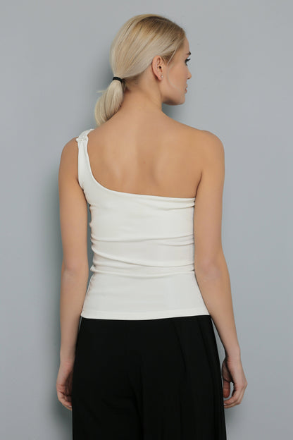 Blouse blanche à une épaule